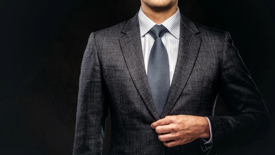 Charcoal suit, shirt and tie for a polished professional look
