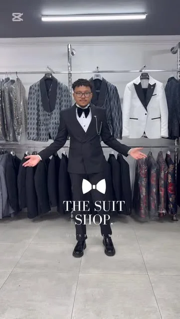 A suit presentation inside The Suit Shop